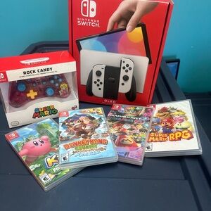 Nintendo Switch OLED with White Controllers and Game Bundle